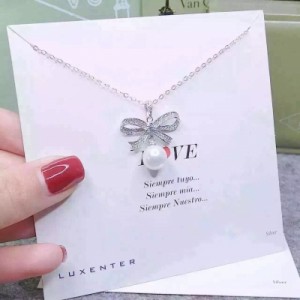 蝴蝶結天然珍珠項鍊，925純銀材質，女生最愛的蝴蝶結，也是首飾設計中不可缺少的元素