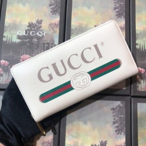 Gucci古馳 原單品質 古奇的標誌是按照從八十年代在前景的老式版畫移動。 復古風格, 主題顯示在前面的一個錢包與拉鍊軟, 質感的皮革 型號:496317尺寸:19x10.5x2.5cm